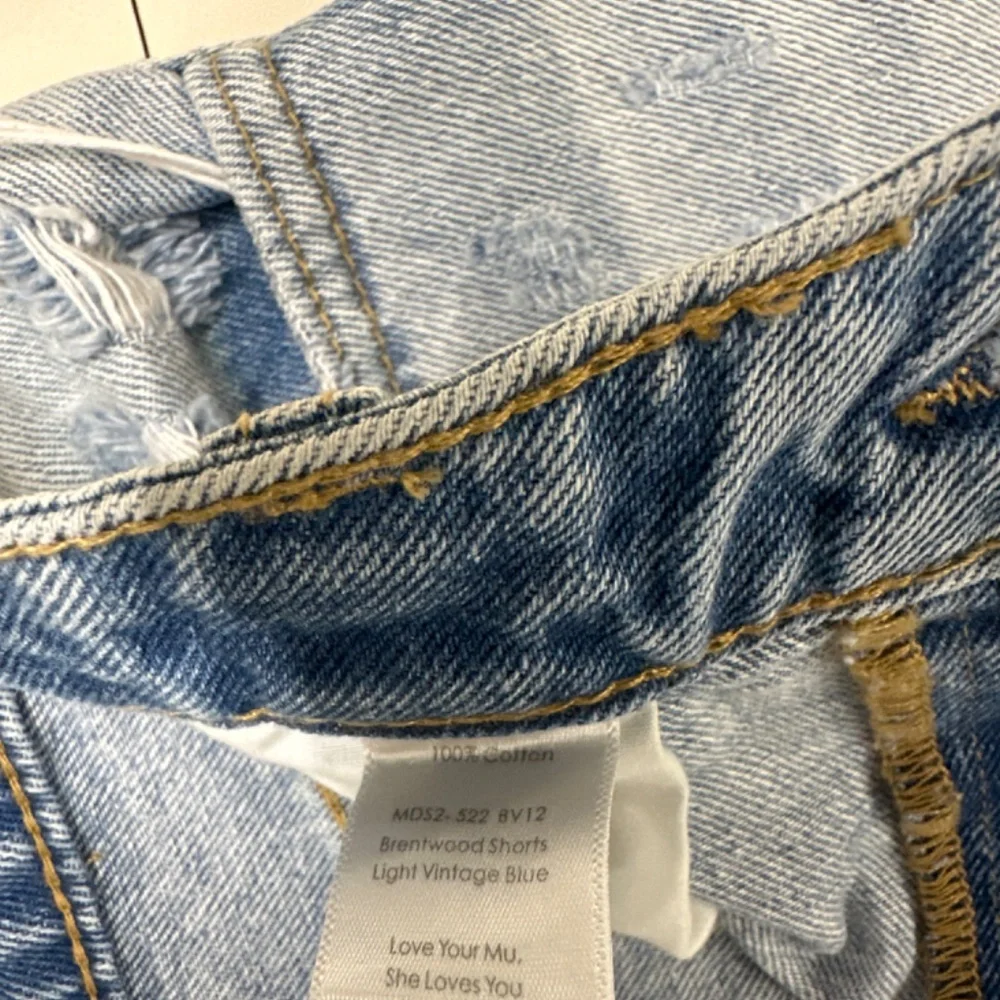 Long Denim distressed Denim shorts
